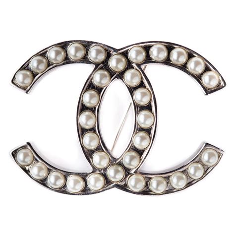 chanel brooch cc